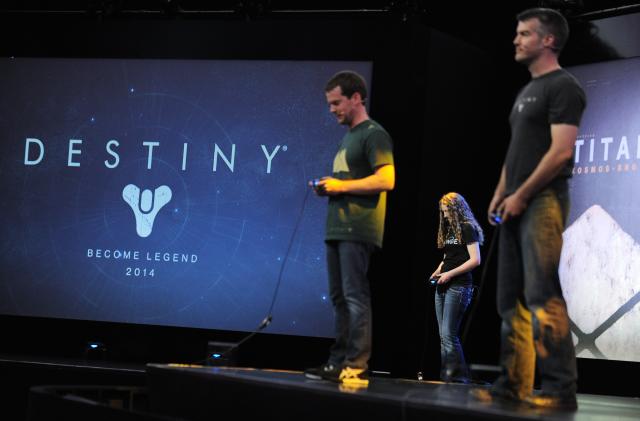 IMAGE DISTRIBUTED FOR SCEA - Joe Staten, Darla Freeze and Jason Jones play onstage at the worldwide premiere of PlayStation 4 gameplay of the highly anticipated Destiny from Bungie and Activision at the PlayStation E3 Press Conference on Monday June 10, 2013 in Los Angeles. (Photo by Jordan Strauss/Invision for SCEA/AP Images)